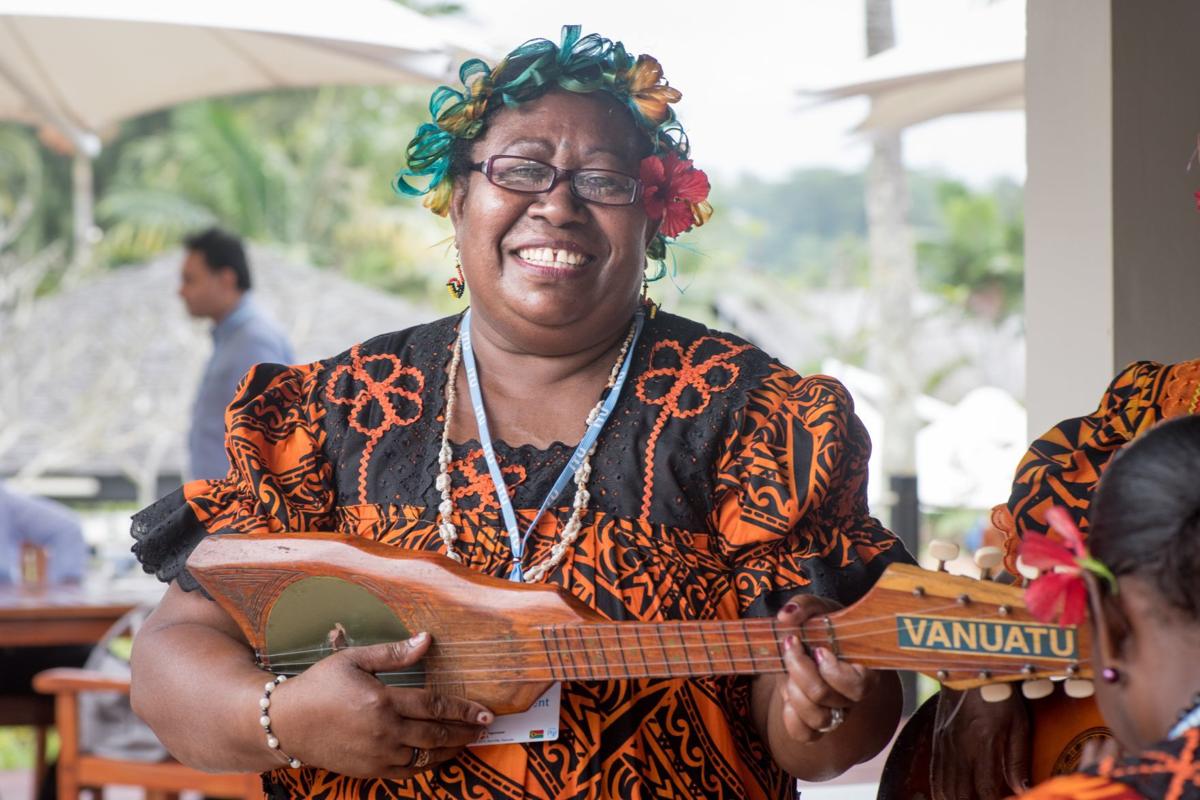 Woman playing Ukulele